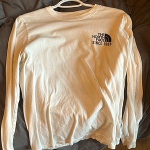White North face long sleeve size medium in women’s